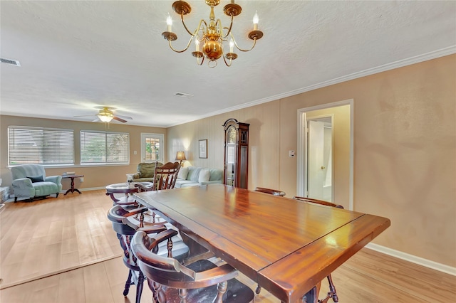 16426 Cavendish Dr, Houston, TX 77059 - dining area with crown molding, light wood-style flooring, a chandelier, and ceiling fan