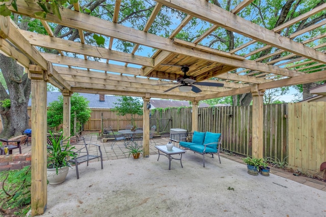 16426 Cavendish Dr, Houston, TX 77059 - fenced backyard with a pergola, a ceiling fan, a patio area, and outdoor lounge area