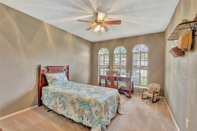 16426 Cavendish Dr, Houston, TX 77059 - carpeted bedroom featuring a textured ceiling and ceiling fan
