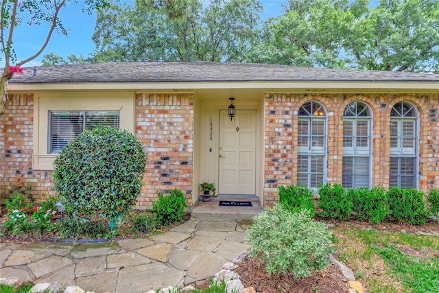 16426 Cavendish Dr, Houston, TX 77059 - view of exterior entry featuring brick siding