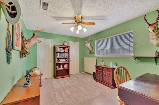 16426 Cavendish Dr, Houston, TX 77059 - carpeted office with ceiling fan and a textured ceiling