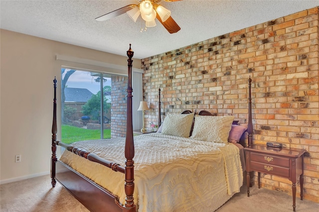 16426 Cavendish Dr, Houston, TX 77059 - bedroom with carpet flooring, a textured ceiling, brick wall, and ceiling fan