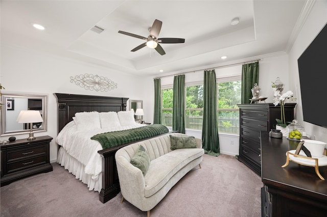 3447 Warwick River Trl, Kingwood, TX 77365 - bedroom featuring a tray ceiling, light carpet, a ceiling fan, and recessed lighting