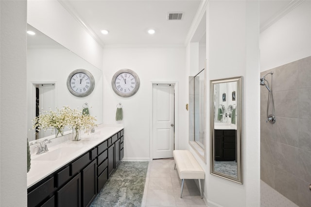 3447 Warwick River Trl, Kingwood, TX 77365 - full bathroom featuring crown molding, tiled shower, double vanity, and tile patterned floors