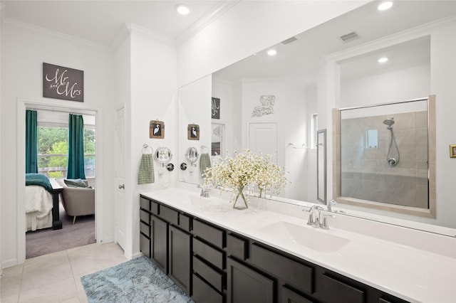 3447 Warwick River Trl, Kingwood, TX 77365 - full bath featuring double vanity, ensuite bath, crown molding, tile patterned floors, and recessed lighting