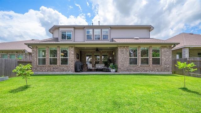 3447 Warwick River Trl, Kingwood, TX 77365 - back of house with ceiling fan, a fenced backyard, a patio area, and brick siding