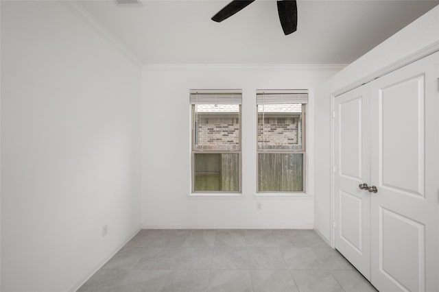 3447 Warwick River Trl, Kingwood, TX 77365 - unfurnished room with ceiling fan, ornamental molding, and light tile patterned flooring
