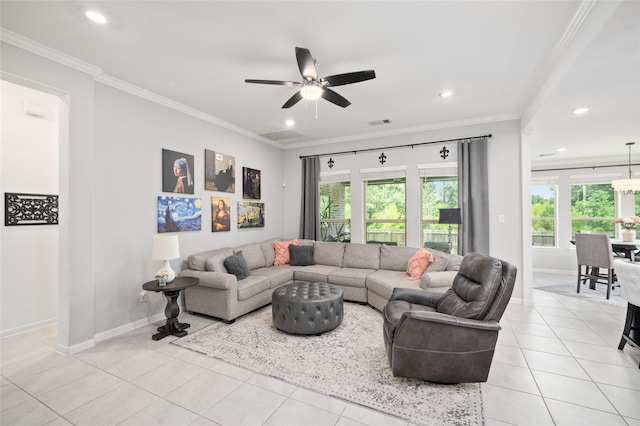 3447 Warwick River Trl, Kingwood, TX 77365 - living area with crown molding, plenty of natural light, light tile patterned floors, ceiling fan, and recessed lighting