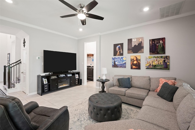 3447 Warwick River Trl, Kingwood, TX 77365 - living area with light tile patterned flooring, ceiling fan, ornamental molding, stairs, and recessed lighting