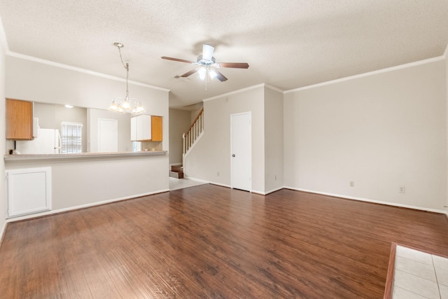 2910 Grants Lake Blvd Unit 1702, Sugar Land, TX 77479 - unfurnished living room with a ceiling fan, wood finished floors, a chandelier, crown molding, and a textured ceiling