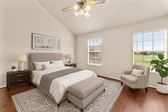 2910 Grants Lake Blvd Unit 1702, Sugar Land, TX 77479 - bedroom featuring lofted ceiling, wood finished floors, a textured ceiling, and ceiling fan