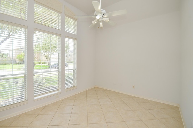 3910 Jade Cove Ln, Sugar Land, TX 77479 - unfurnished room featuring plenty of natural light, light tile patterned flooring, and a ceiling fan