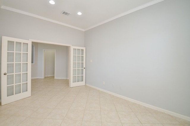 3910 Jade Cove Ln, Sugar Land, TX 77479 - empty room featuring french doors, crown molding, recessed lighting, and light tile patterned floors
