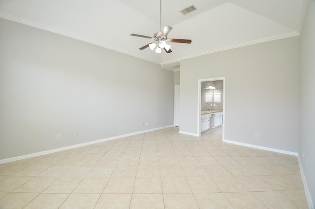 3910 Jade Cove Ln, Sugar Land, TX 77479 - empty room featuring a ceiling fan, ornamental molding, light tile patterned flooring, and vaulted ceiling