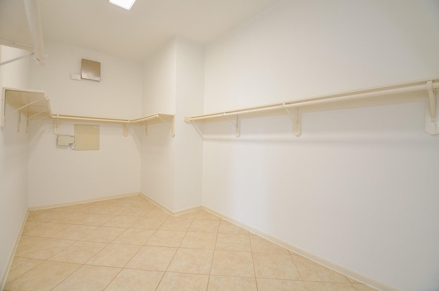 3910 Jade Cove Ln, Sugar Land, TX 77479 - walk in closet featuring light tile patterned floors