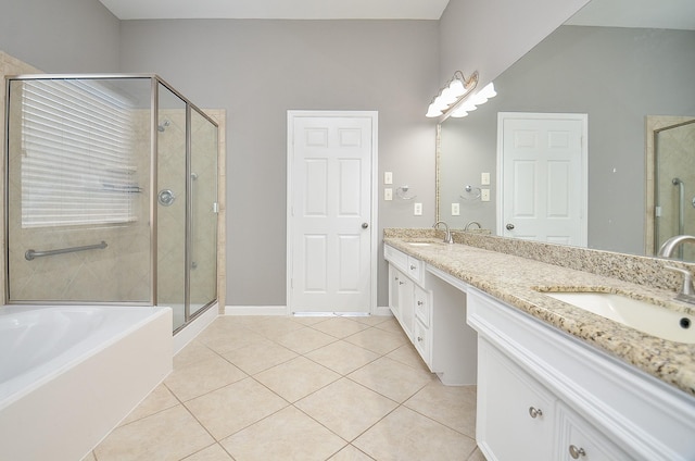 3910 Jade Cove Ln, Sugar Land, TX 77479 - bathroom featuring double vanity, tile patterned floors, a shower stall, and a bath