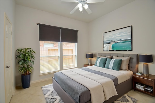 3910 Jade Cove Ln, Sugar Land, TX 77479 - bedroom with light tile patterned floors, multiple windows, and a ceiling fan