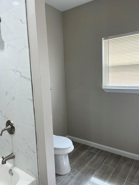 1012 Rd 5606, Cleveland, TX 77327 - full bath featuring toilet and washtub / shower combination