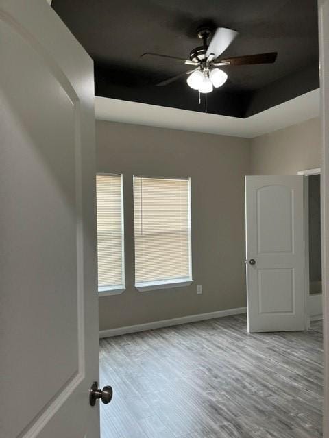 1012 Rd 5606, Cleveland, TX 77327 - empty room featuring a ceiling fan and wood finished floors