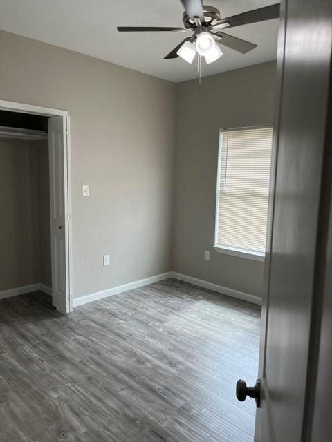 1012 Rd 5606, Cleveland, TX 77327 - unfurnished bedroom featuring wood finished floors and a ceiling fan