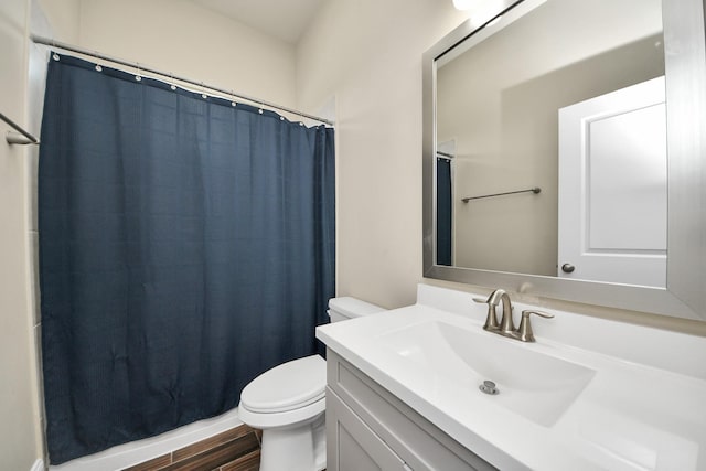 31201 Redwood Manor Ct, Spring, TX 77386 - full bathroom with vanity, a shower with shower curtain, and wood finished floors
