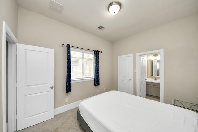 31201 Redwood Manor Ct, Spring, TX 77386 - bedroom featuring light carpet and connected bathroom