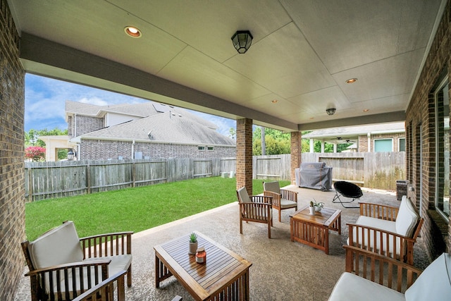 31201 Redwood Manor Ct, Spring, TX 77386 - fenced backyard featuring an outdoor living space and a patio