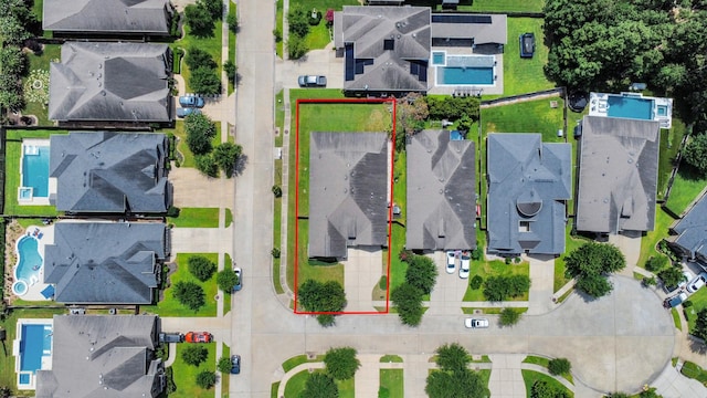 31201 Redwood Manor Ct, Spring, TX 77386 - aerial perspective of suburban area with a pool and property boundaries highlighted