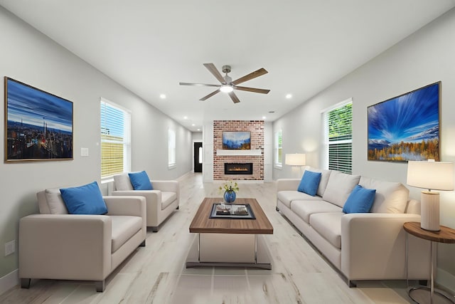 335 Todd St, Tomball, TX 77375 - living room with a ceiling fan, a fireplace, healthy amount of natural light, light wood-type flooring, and recessed lighting