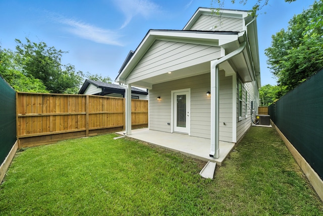 335 Todd St, Tomball, TX 77375 - back of house featuring a patio area and a fenced backyard