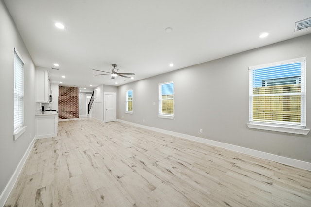 335 Todd St, Tomball, TX 77375 - unfurnished living room featuring light wood-style flooring, recessed lighting, and a ceiling fan