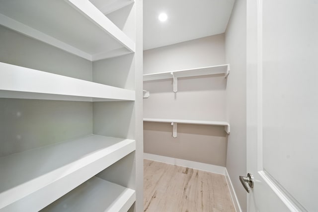 335 Todd St, Tomball, TX 77375 - spacious closet with wood finished floors