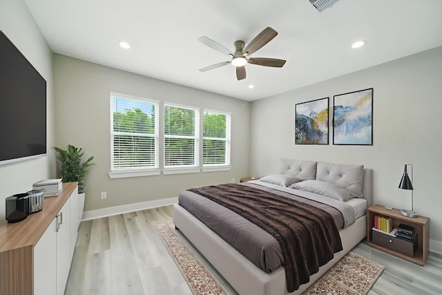 335 Todd St, Tomball, TX 77375 - bedroom featuring light wood-type flooring, recessed lighting, and a ceiling fan
