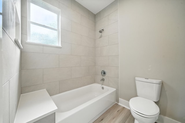 335 Todd St, Tomball, TX 77375 - full bath with wood finished floors and bathing tub / shower combination
