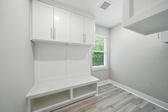 335 Todd St, Tomball, TX 77375 - mudroom featuring light wood-style flooring and baseboards