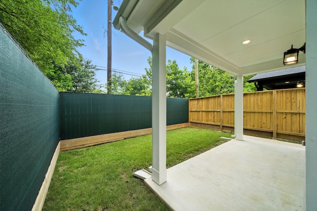 335 Todd St, Tomball, TX 77375 - fenced backyard with a patio