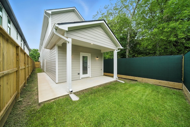 335 Todd St, Tomball, TX 77375 - rear view of house with a patio area and a fenced backyard