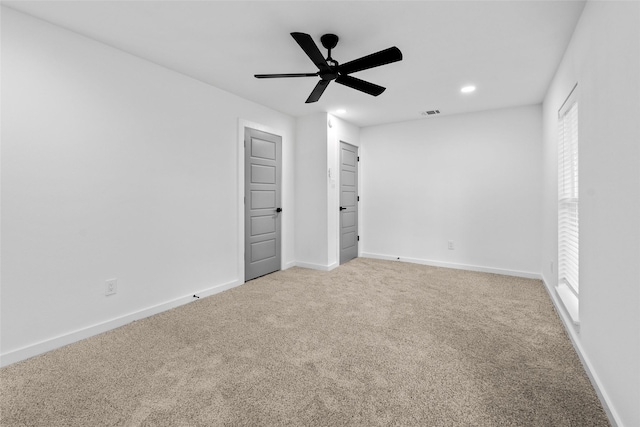 8707 Wind Side Dr, Houston, TX 77040 - unfurnished bedroom featuring carpet flooring, recessed lighting, multiple windows, and a ceiling fan