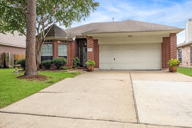 17227 Horsetooth Canyon Dr, Houston, TX 77095 - single story home with brick siding, an attached garage, concrete driveway, and a shingled roof