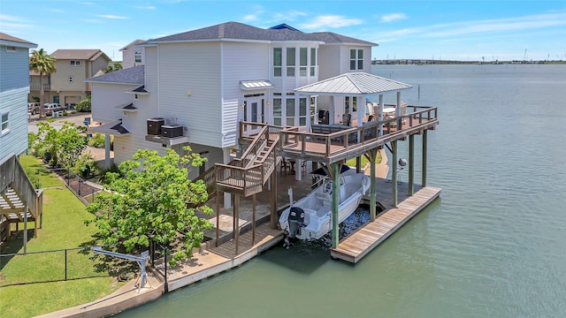 1303 Outrigger, Tiki Island, TX 77554 - dock with a deck with water view and stairs