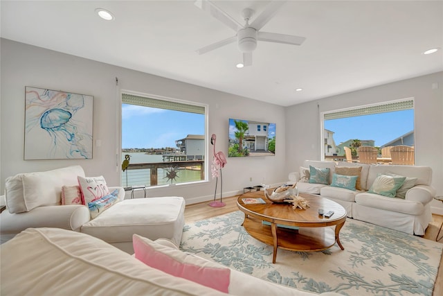 1303 Outrigger, Tiki Island, TX 77554 - living area featuring wood finished floors, recessed lighting, and ceiling fan