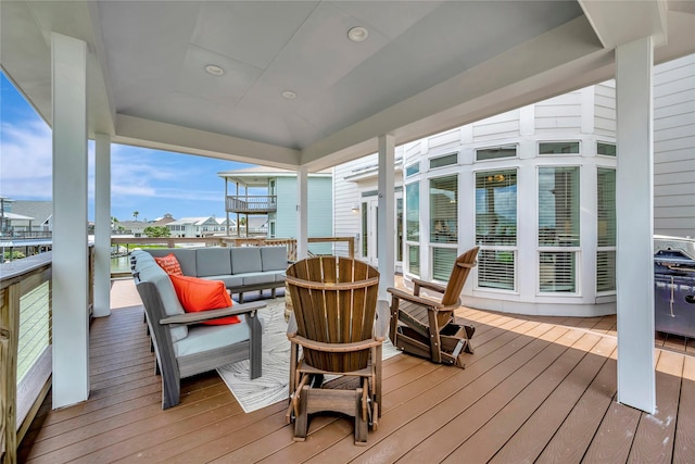 1303 Outrigger, Tiki Island, TX 77554 - wooden terrace with outdoor lounge area