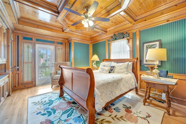 1303 Outrigger, Tiki Island, TX 77554 - bedroom with a wooden ceiling with exposed beams, ornamental molding, wooden walls, coffered ceiling, and light wood-style flooring