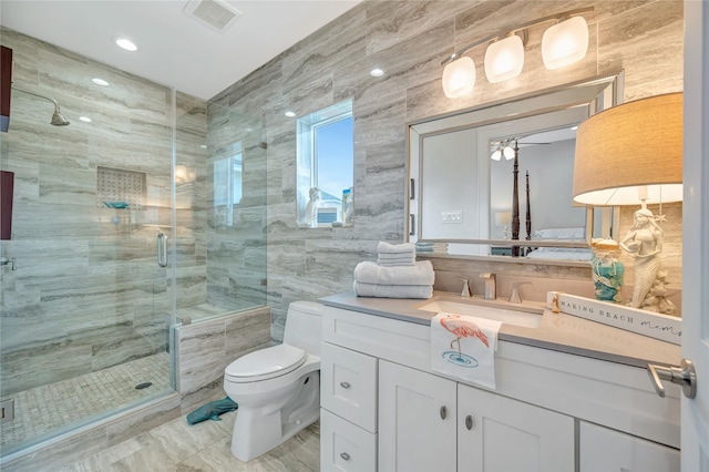 1303 Outrigger, Tiki Island, TX 77554 - full bath with tile walls, a stall shower, and vanity