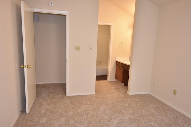 16702 Vista Oak Dr, Houston, TX 77073 - unfurnished bedroom featuring light carpet and ensuite bathroom