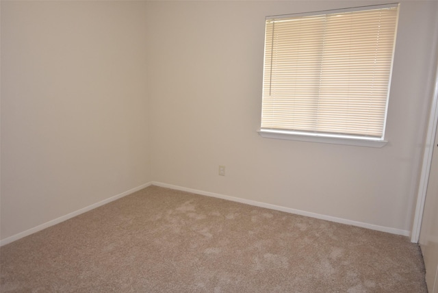 16702 Vista Oak Dr, Houston, TX 77073 - carpeted empty room with baseboards
