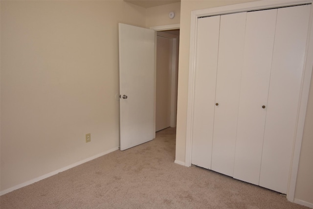 16702 Vista Oak Dr, Houston, TX 77073 - unfurnished bedroom featuring light carpet and a closet