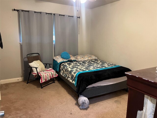 8823 Shadow Crest St, Houston, TX 77074 - bedroom featuring light carpet and baseboards