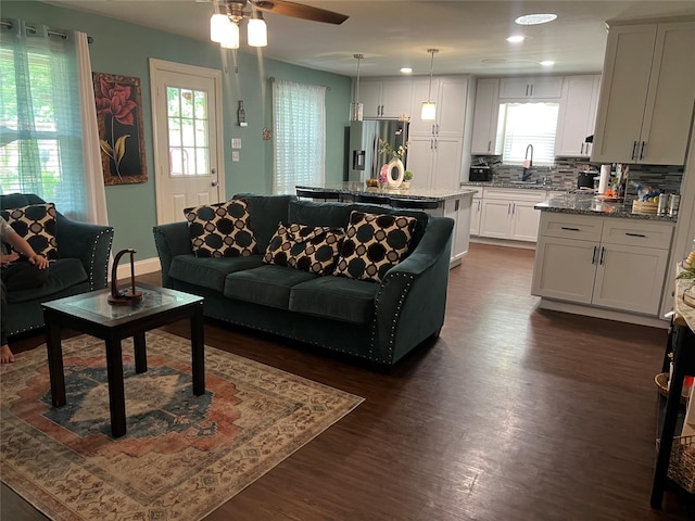 8823 Shadow Crest St, Houston, TX 77074 - living room with dark wood-type flooring, a ceiling fan, and recessed lighting