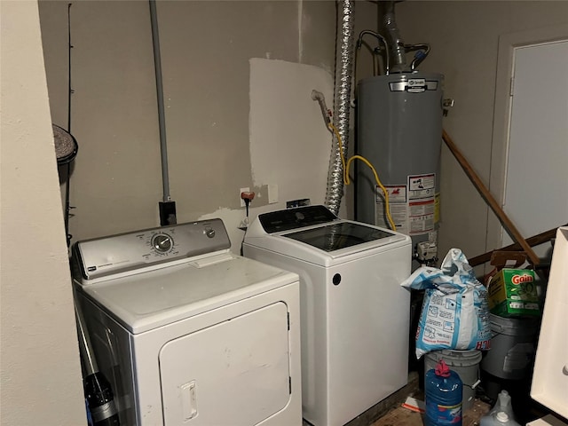 8823 Shadow Crest St, Houston, TX 77074 - laundry area with independent washer and dryer and water heater